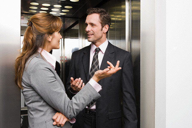 Colleagues having discussion --- Image by © Image Source/Corbis